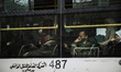 Syrian people after they got a seat in public transportation A group of people Wrestling t...