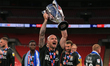   Alan McCormack of Northampton Town lifts the trophy during the Sky Bet League 2 Play-Off...