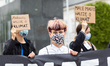 School students in face protective masks gather on July 11, 2020 amid Coronavirus pandemic...