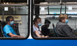 People wear protective face masks inside a tram while the coronavirus pandemic continues i...