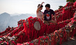 Xi'an, China, the 30 June 2011. A couple comes to pray on the mount Hua. It is a mountain...