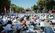Faithful wait at the historic Sultanahmet district of Istanbul, outside the Hagia Sophia,...