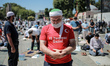 Faithful wait at the historic Sultanahmet district of Istanbul, outside the Hagia Sophia,...