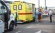 A doctor helps his colleague to put on the Hazmat suit near airport in Brussels, Belgium,...