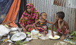 A flood affected family takes shelter on the high place at Manikganj near Dhaka, Banglades...