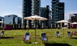 Lido bam, an oasis of greenery in Milan Porta Nuova equipped with umbrellas and deckchairs...