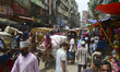 Bangladeshi peoples gathered at a market area during the COVID-19 coronavirus pandemic in...