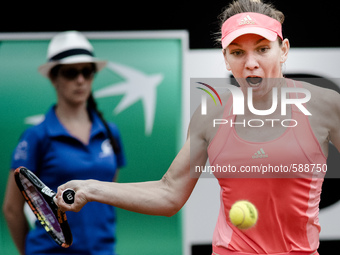  Simona Halep of Romania in action during her Women's Semi Final against Carla Suarez Navarro of Spain on Day Seven of The Internazionali BN...