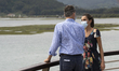 King Felipe VI and his wife Dona Letizia pose in the viewpoint of the fishing port of Sant...