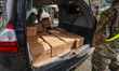 U.S. Army personnels distribute relief goods at Al Oerter Rec Center as New York City ente...