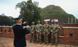 American soldiers are photographed during a ceremony at the Kosciuszko Mound in Krakow, Po...