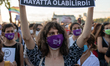 Women wearing protective face masks seen during a protest against the recent femicides and...