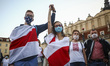 People demonstrate at the Main Square in solidarity with Belarus. Krakow, Poland on August...