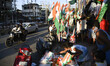 Vendor selling tricolour on the street in the eve of Independence day, amid coronavirus pa...