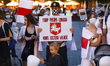 People demonstrate at the Main Square in solidarity with Belarus. Krakow, Poland on August...