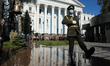 Guard marches near the Monument of Fallen Heroes during the commemorative ceremony at the...