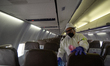 Disinfection teams are assigned to disinfect flights before passangers board to prevent th...