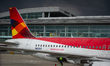 A plane of the airliner Avianca sits at el Dorado Airport after five months of inactivity...