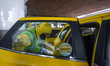 A disinfection team is assigned to clean and disinfect taxi cabs as they arrive and before...