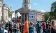 Activists from Extinction Rebellion gather at London's Trafalgar Square ahead of their mar...