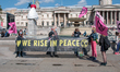 Activists from Extinction Rebellion gather at London's Trafalgar Square ahead of their mar...