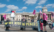 Activists from Extinction Rebellion gather at London's Trafalgar Square ahead of their mar...