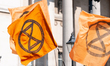 Activists from Extinction Rebellion gather at London's Trafalgar Square ahead of their mar...