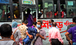Passenger wearing face mask make their travels in a Bus during the coronavirus pandemic in...