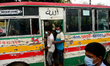 Passenger wearing face mask make their travels in a Bus during the coronavirus pandemic in...