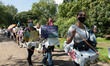 Environmental activists from Extinction Rebellion including anti-HS2 demonstrators march t...
