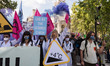 Environmental activists from Extinction Rebellion gather in Parliament Square on the first...