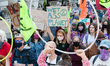 Environmental activists from Extinction Rebellion march to Parliament Square on the first...