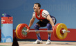 Khamatshin Roman of Russia competes in the Men's 85kg Group A weightlifting snatch competi...