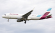 A Eurowings Airbus A320 lands at Newcastle Airport, England on  2nd September 2020, to res...