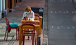 A woman waits for her lunch outiside of a restaurant located in the Candelaria neighboorho...