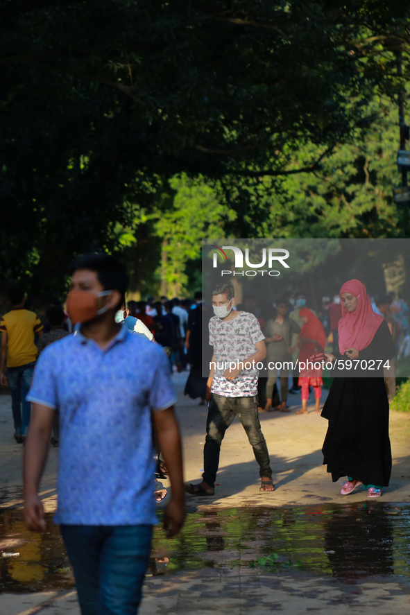 People are visiting at a park in Dhaka, Bangladesh on September 4, 2020.  