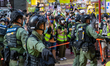 Hong Kong Police deploy 2000 officers in response to calls online to protest the postponed...