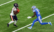 Chicago Bears cornerback Kyle Fuller (23) runs the ball against Detroit Lions cornerback T...