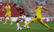   Marcus Tavernier of Middlesbrough battles for possession with Mads Juel Andersen of Barn...
