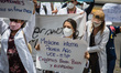Hundreds of graduate medical students from different universities in Ecuador protest again...