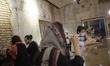 Iranian youth sit in a cafe in the Argo Factory in Tehran’s business district, amid the ne...