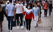 Shoppers, some wearing face masks, walk along Regent Street in London, England, on Septemb...