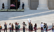 People pay respects as Justice Ruth Bader Ginsburg lies in repose under the Portico at the...
