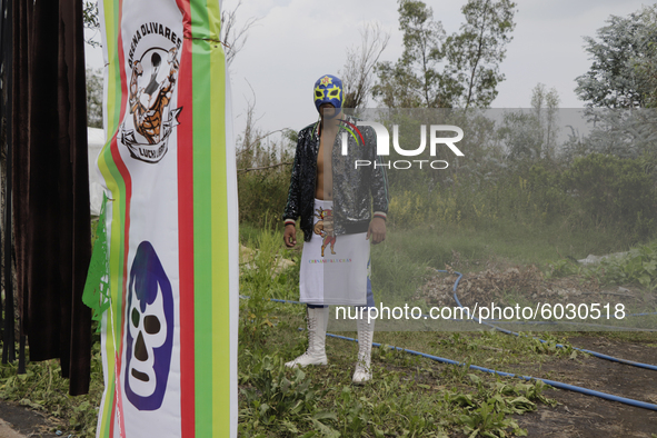 Gran Felipe Jr., a member of Chinampaluchas, prior to the wrestling function in chinampa of Lake Xochimilco during the health emergency due...
