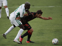Omenuke Mfulu of Elche and Mikel Oyarzabal of Real Sociedad battle for the ball during the La Liga Santader match between Elche CF and Real...