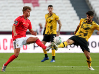 Luca Waldschmidt of SL Benfica (L) vies with Fabio Pacheco of Moreirense FC (R ) during the Portuguese League football match between SL Benf...