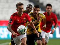 Alejandro Grimaldo of SL Benfica (L) vies with Lucas Rodrigues of Moreirense FC during the Portuguese League football match between SL Benfi...