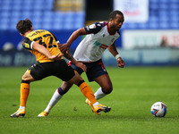 Boltons Nathan Delfounseco battles with Liam Shephard  during the Sky Bet League 2 match between Bolton Wanderers and Newport County at the...
