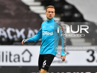  
Mike te Wierik of Derby County warms up ahead of kick-off during the Sky Bet Championship match between Derby County and Blackburn Rovers...