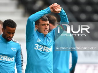  
Jason Knight of Derby County warms up ahead of kick-off during the Sky Bet Championship match between Derby County and Blackburn Rovers a...